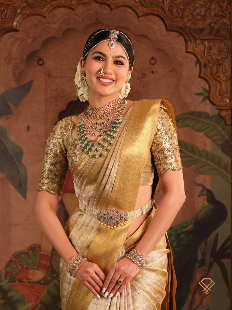 Meralda muse in gold Kanjivaram with temple jewellery